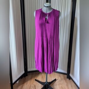 Light purple, sleeveless, ties/tassels at the neckline, lined dress